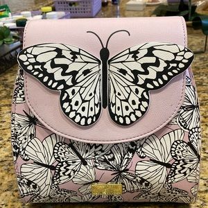 Fun butterfly bag in pink with white and black butterfly all over